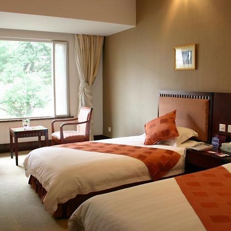 Suzhou Taoyuan International Holiday Hotel Room photo