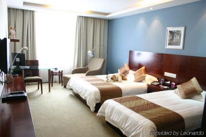 Suzhou Taoyuan International Holiday Hotel Room photo